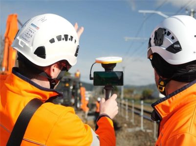 Two rail workers using augmented reality for machine avoidance