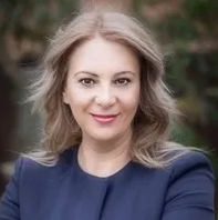 Head shot of Lidija Dumbaloska in smart workwear